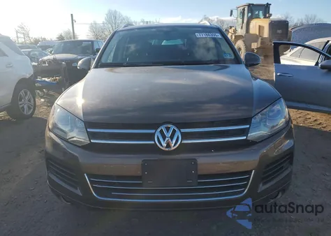 2012 Volkswagen Touareg V6 z USA, uszkodzony, nr VIN WVGFF9BP7CD001968